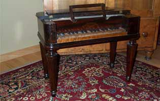 English Antique rosewood childs piano Circa 1860